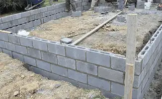 Professionals building a foundation with blocks in Naperville, IL