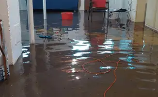 Basement with boiler, cabinets and washing machine completely flooded in Naperville, IL
