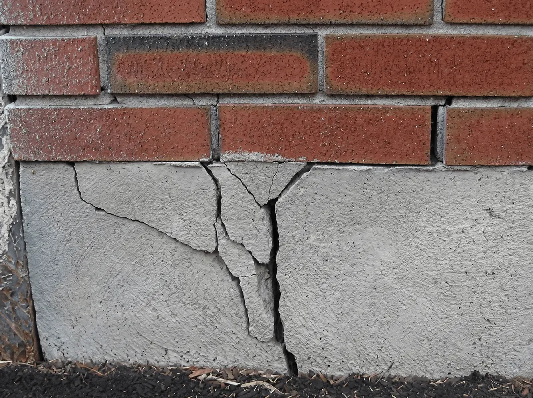Concrete foundation with serious structural damage in Naperville, IL