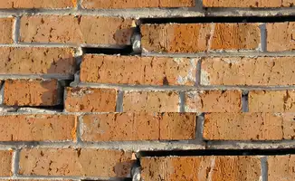 Brick wall with serious structural damage in Naperville, IL